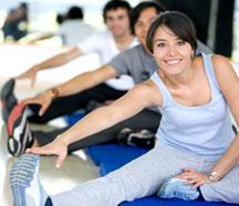 Three people smiling and stretching