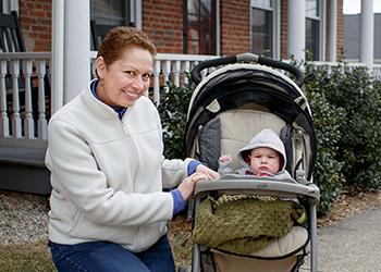 Woman and baby smiling